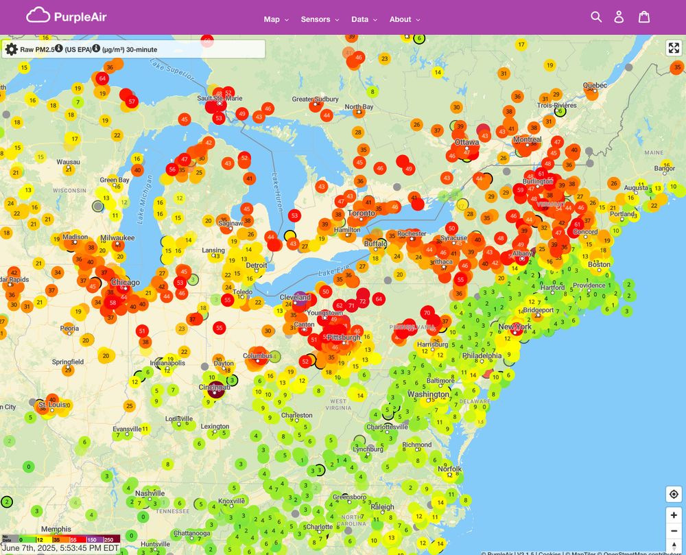 PurpleAir air monitor map showing north eastern United States. A red stripe of air pollution (red dots) spans from Chicago to New Hampshire through Pittsburgh. 