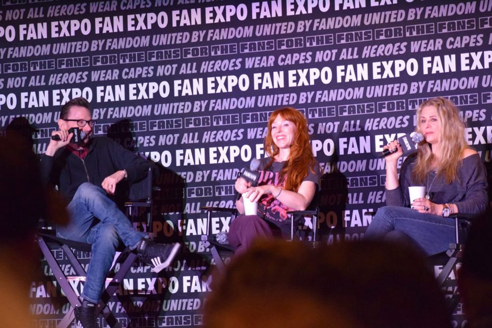 DJ Qualls, Ruth Connell, & Samantha Smith on stage for Supernatural panel.