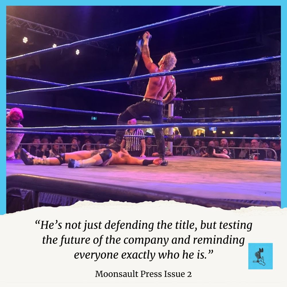 A photo of Adam Brooks standing victorious over his opponent Lucky O'Leary. Below is a quote from the zine "He's not just defending the title, but testing the future of the company and reminding everyone exactly who he is"