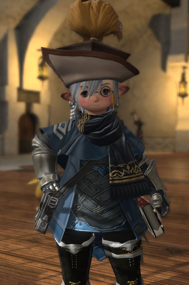 A blue boy Lalafell character wearing an Ivalician Chemist's Monocle
