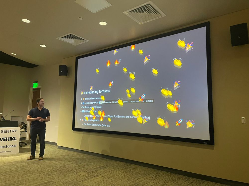 Photo of the VueConf US 2025 stage during Daniel Roe's talk on the State of Nuxt 2025 where he announces fontless - a Vite plugin to apply "Magical plug-and-play font optimization for modern web applications"