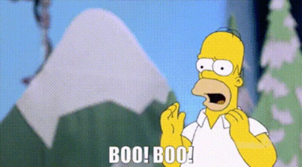 homer simpson from the simpsons is screaming and saying boo ! boo !