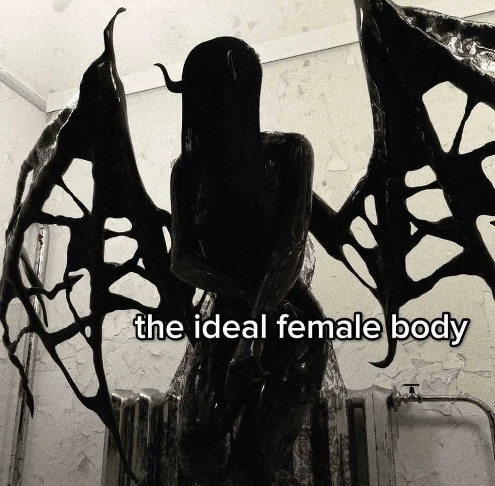 A female figure with patchy wings covered in an inky black substancd