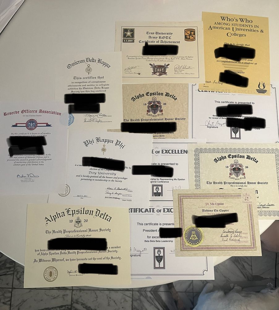 A bunch of honor society certificates 