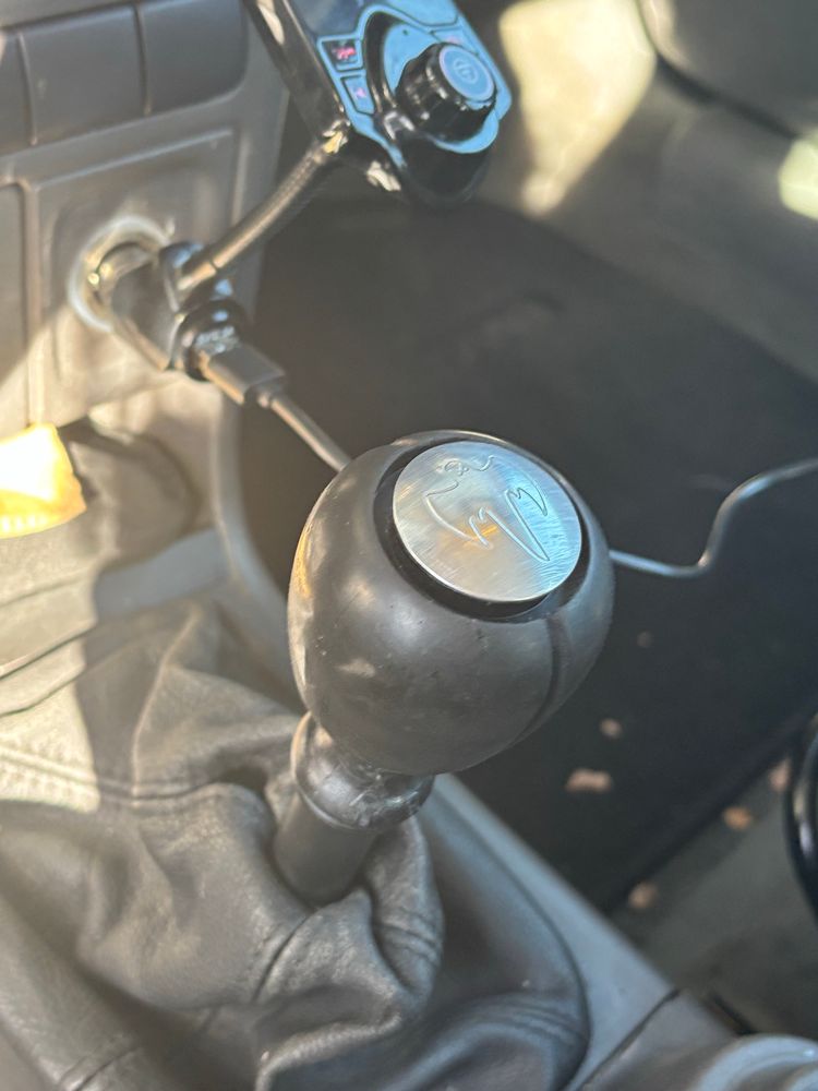 Ghost squadron symbol on shift knob in a 2001 Saab 9-3