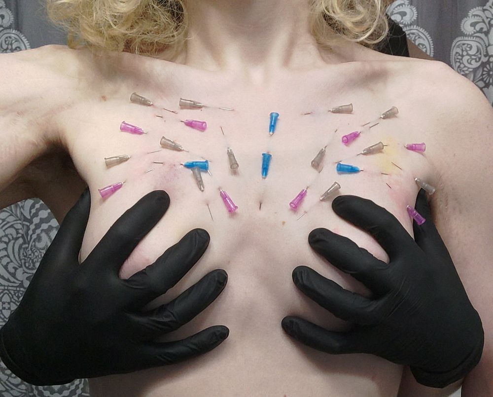 Needles in flesh, gloved hands on tits.