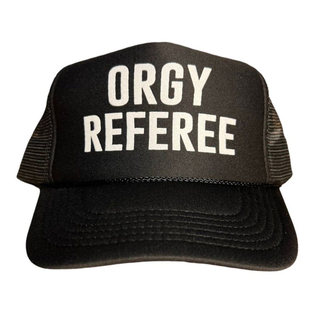 black hat that reads "orgy referee"