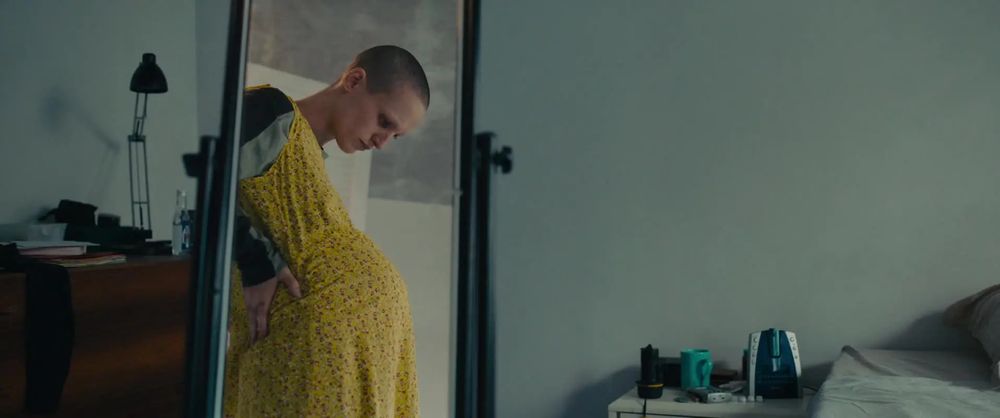 adrien tries on a dress