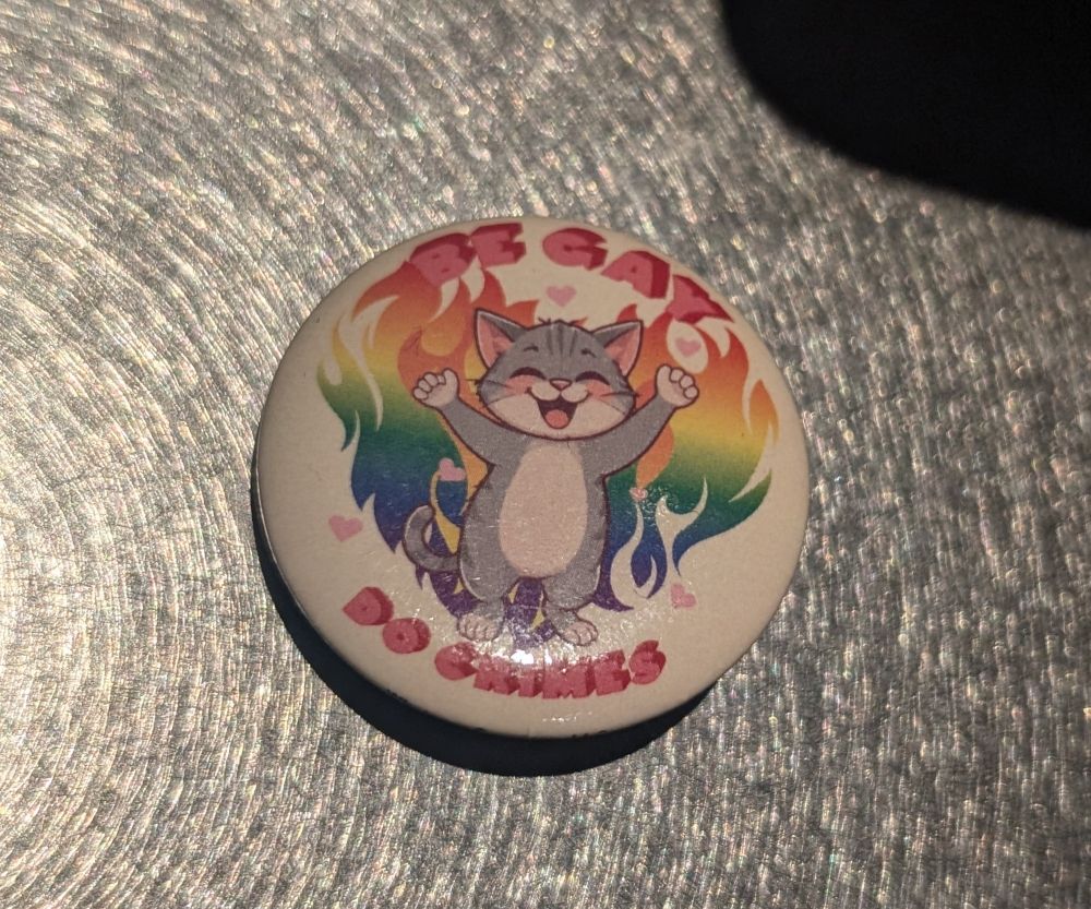 high quality zoom in of an aislop generated cat with 6 fingers on one paw and 4 on the other. half the stripes on the left are pointy and sharp while the others on the right are blocky and cut off. the cat has 4 toes on one paw and 3 on the other with very bizzare rainbow fire that doesnt line up with the background. a very embarrassing pin if i do say so myself.