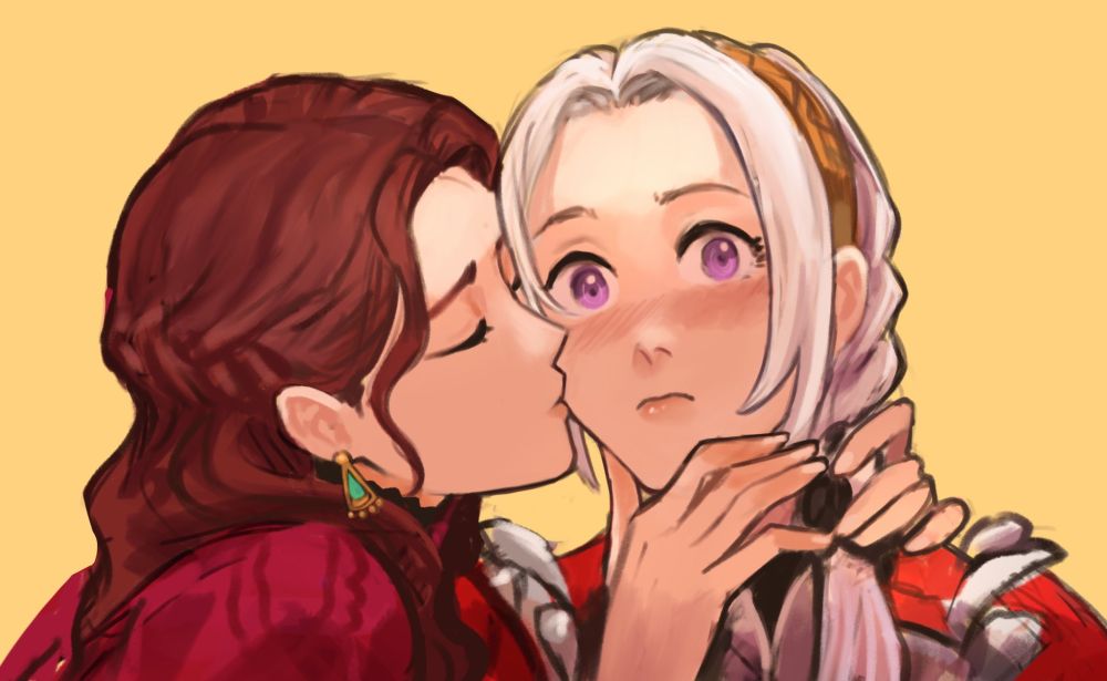 Dorothea kissing Edelgard and her being shy.