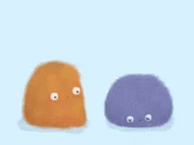 two stuffed animals , one orange and one blue , are standing next to each other on a blue background .