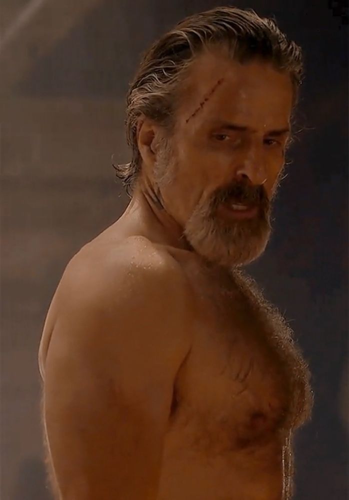 A close up of Izzy Hands and his hairy heaving bosom 