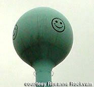 water tower w/ smiley faces