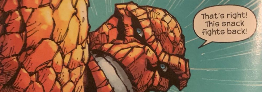 A panel from the new Fantastic Four #1 showing Ben Grimm, a hero who looks like his body is made of orange bricks, in close-up. He is saying, “That’s right! This snack fights back!”