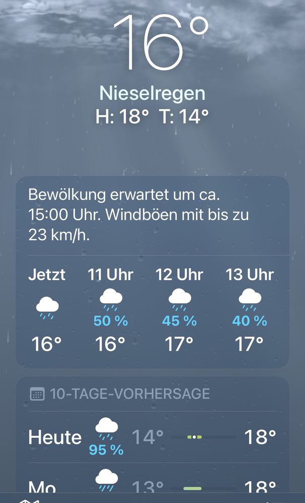 Foto der Wetter-App. Nieselregen, 18 Grad Celsius.