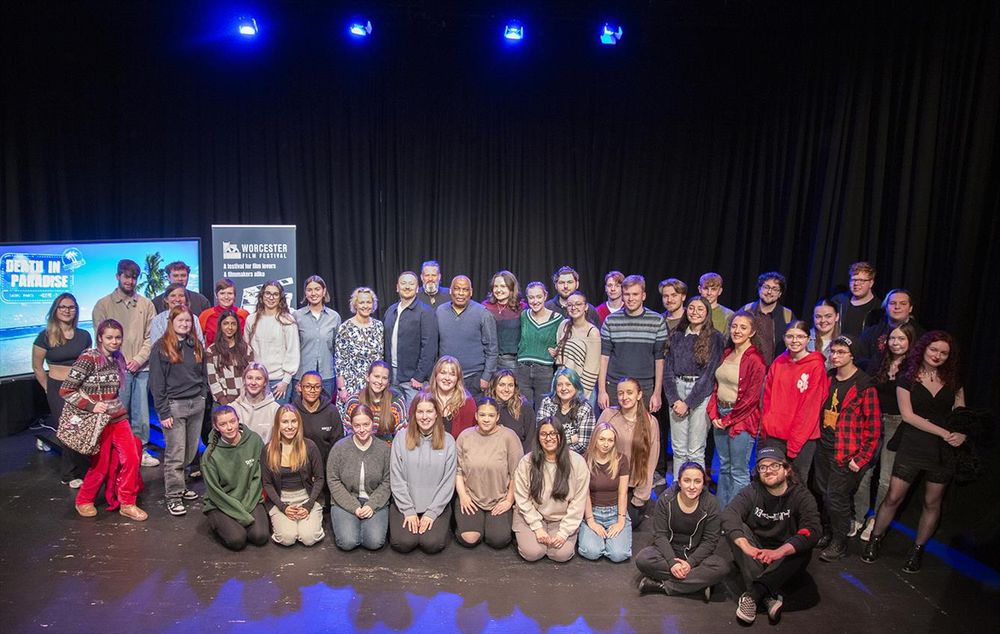 Group photo of arts and humanities students with members of the Death in Paradise team.  