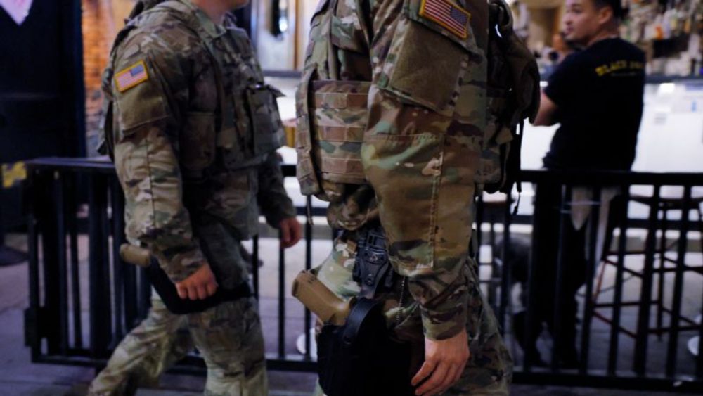 US National Guard members deployed to Washington, DC, started carrying their sidearms on Sunday, a spokesperson for the Joint Task Force carrying out the mission told CNN.