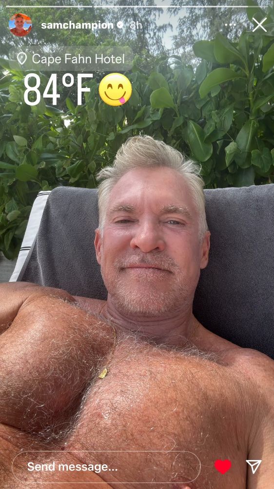 Sam Champion shirtless and he has a lot of chest hair 