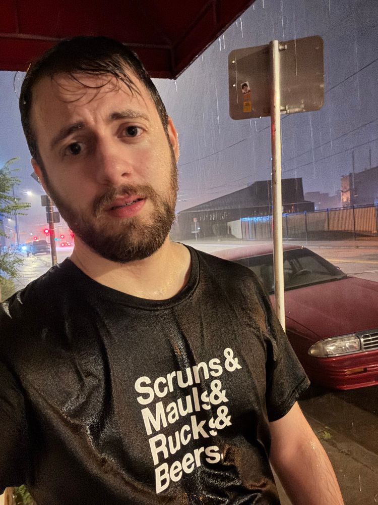 Me outside soaking wet wearing my rugby shirt 