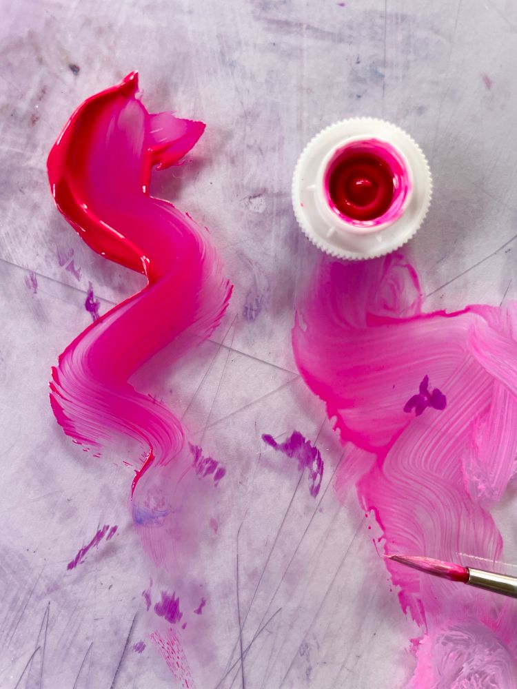 Bright neon pink oil paint 
