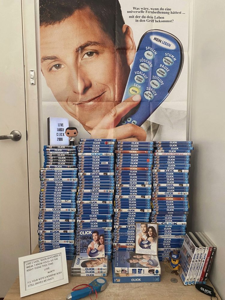 So many copies of Click. So many more than you could possibly think. In every language, in every format. DVD, Blu-ray, VHS, UMD, Korean, Japanese, Russian...
All in front of a German click poster. The Click never ends.