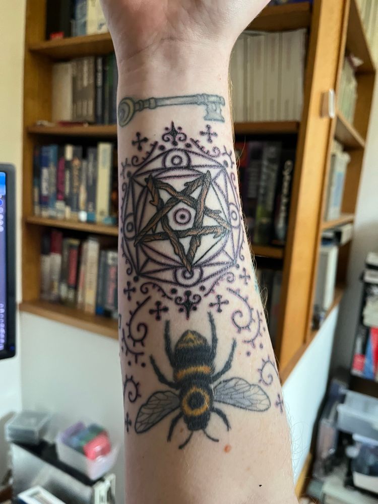 Wooden pentacle ornamental tattoo