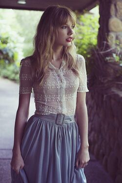 Taylor in the same outfit standing on a porch looking to the side. these images always gave me safe & sound and hunger games vibes so I love them 