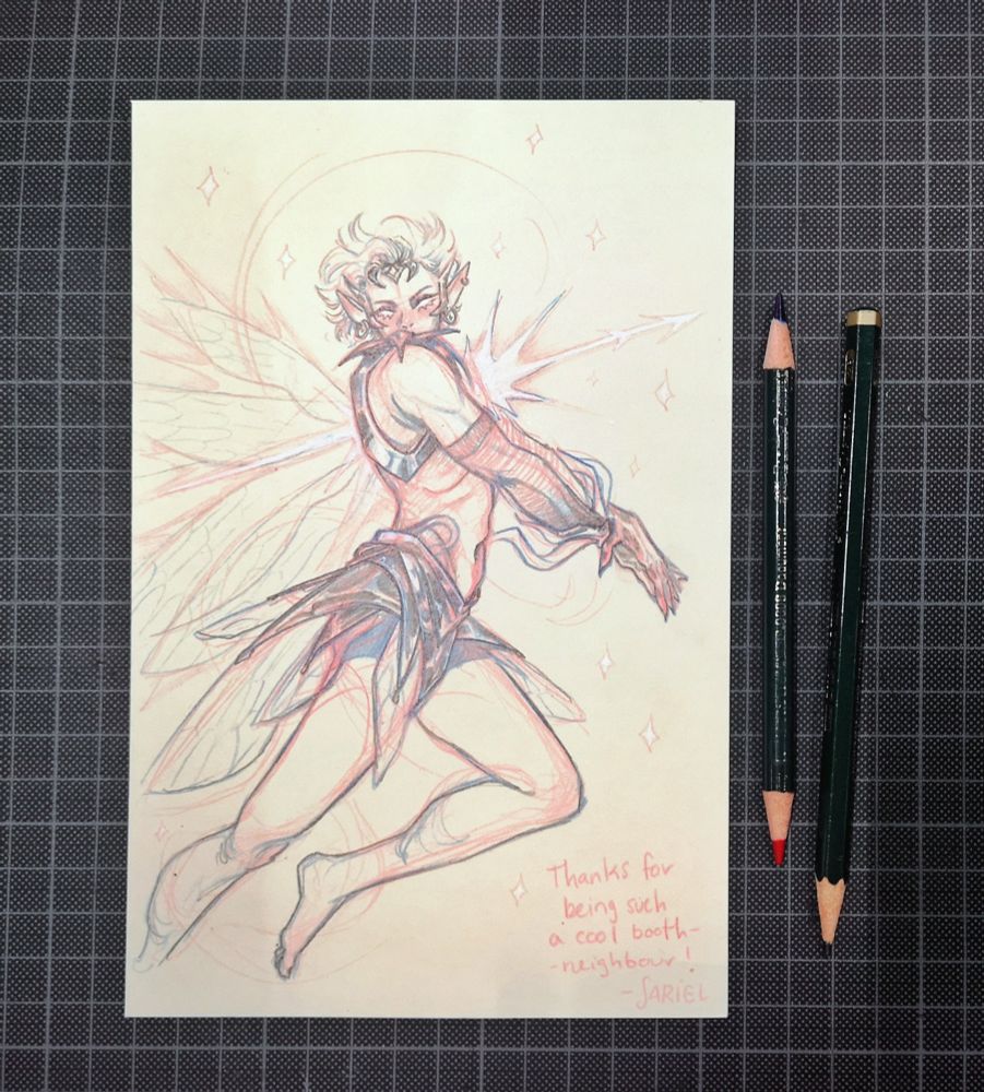 A traditional drawing of a non binary space fairy drawn in red, blue and graphite. 