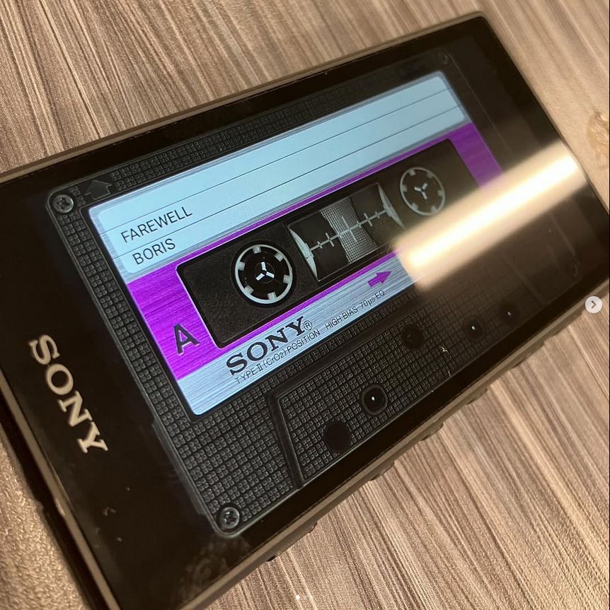 a sony walkman playing the album Pink by the band Boris