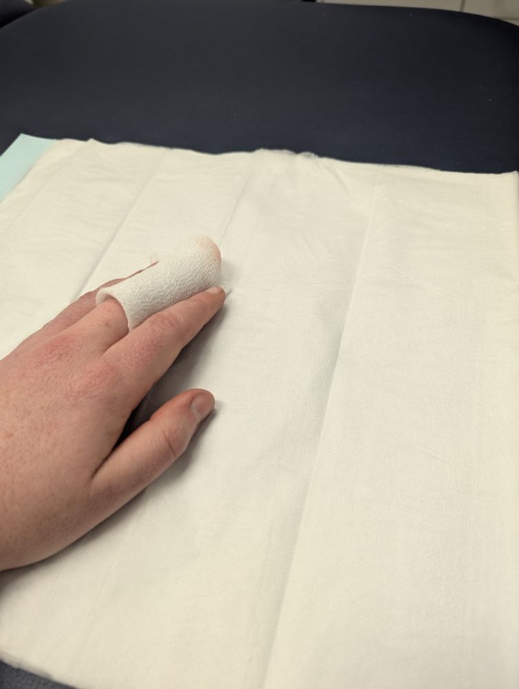 A hand wrapped in gauze.
