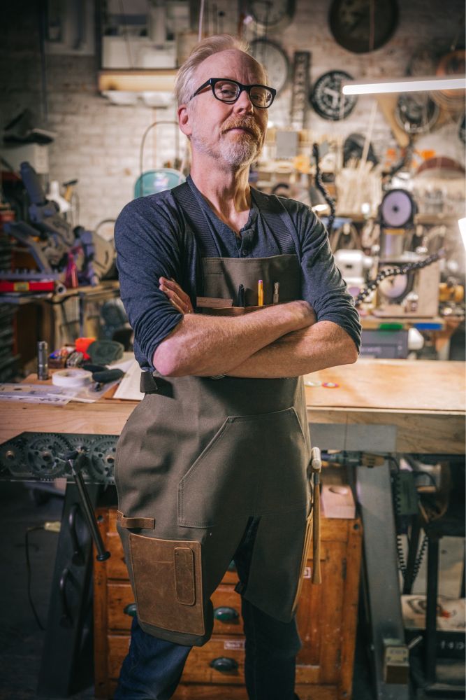 Model builder Adam Savage in a work apron.