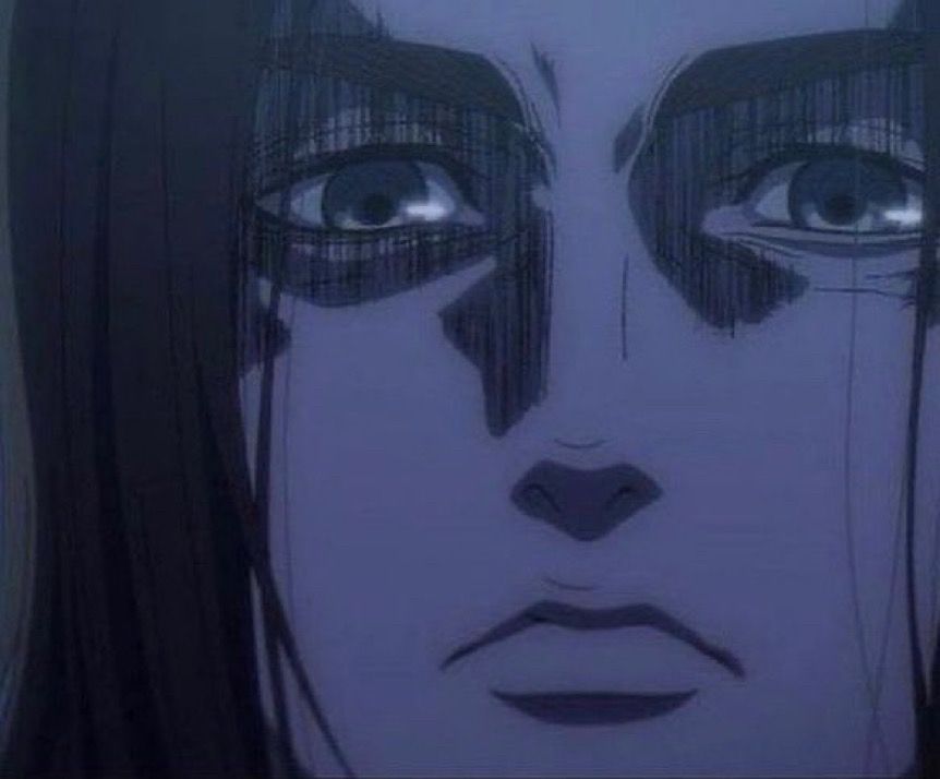 Attack on Titan main protagonist, Eren Yeager, giving a scowl 
