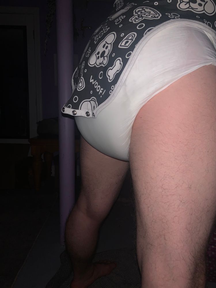 From behind, a very well used diaper hiding underneath my onesie
