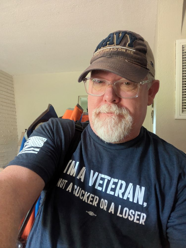 Selfie. Navy Veteran ball cap that says "Don't tread on me" and my T-shirt from VoteVets that reads "I'm a Veteran not a sucker or a loser." FDT