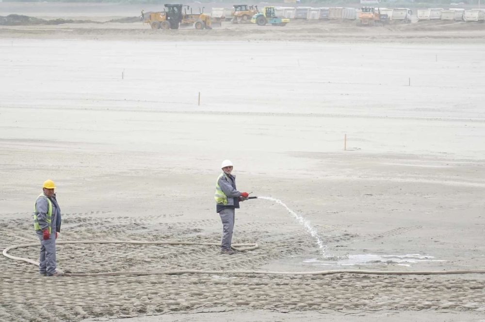Workers preparing to build a stadium on the land bought back from Al Dahra. Photo credit: Antonio Ahel/ATAImages