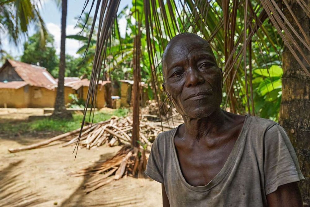 James David, an elder from Kollendarpolo, a town inside Socfin’s Salala rubber plantation in Liberia. Image by Ashoka Mukpo for Mongabay.