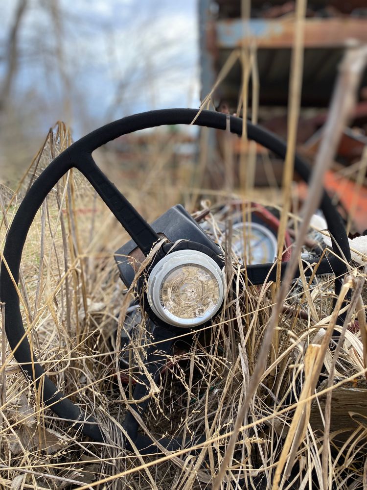 A steering wheel from an old tractor