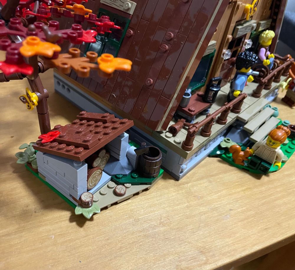 Woodpile and verandah of Lego cabin