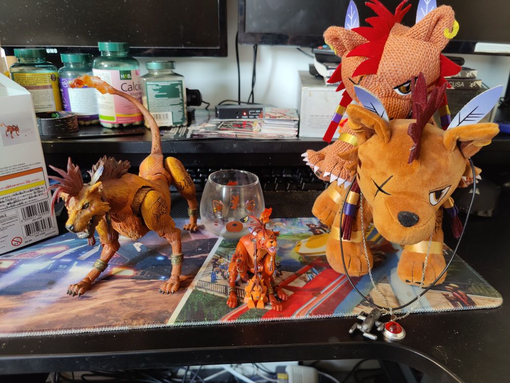 Figure with lots of other Red XIII merch