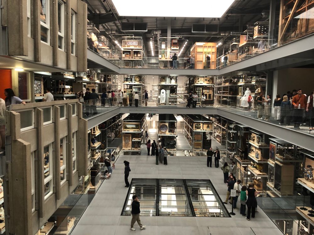 View of several floors of the storehouse. Looks a bit like Westfield shopping centre but with more decorative objects