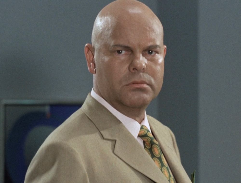 Andy Andersen spiller Serafino/Serafimo Motserella/Motzerella/Mozzarella/Whatever i Olsebanden og Dynamitt Harry.