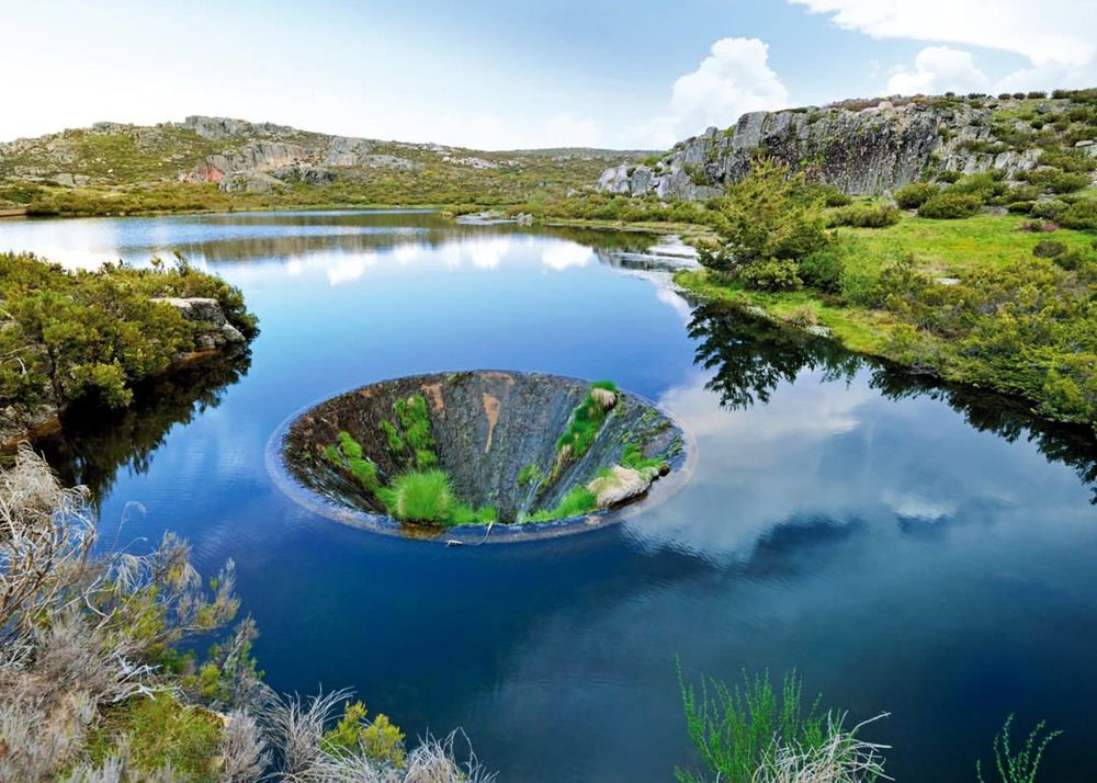 Picture of "Covão dos Conchos", in Portugal. It's an artificial lake in the Serra da Estrela mountains that is famous for its bell-mouth spillway. Description adapted from Wikipedia.