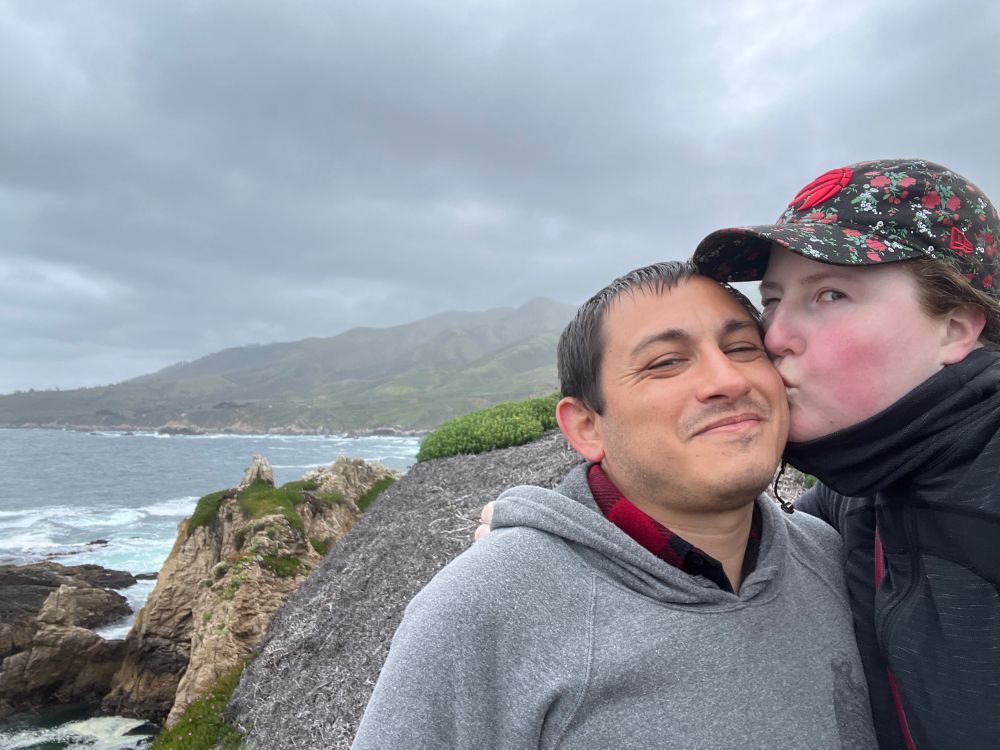 Wait wtf why are the alt text character limits 2000 whereas the Bluesky character post limits so much smaller??
A picture of 2 newlyweds on a coast hike. 
