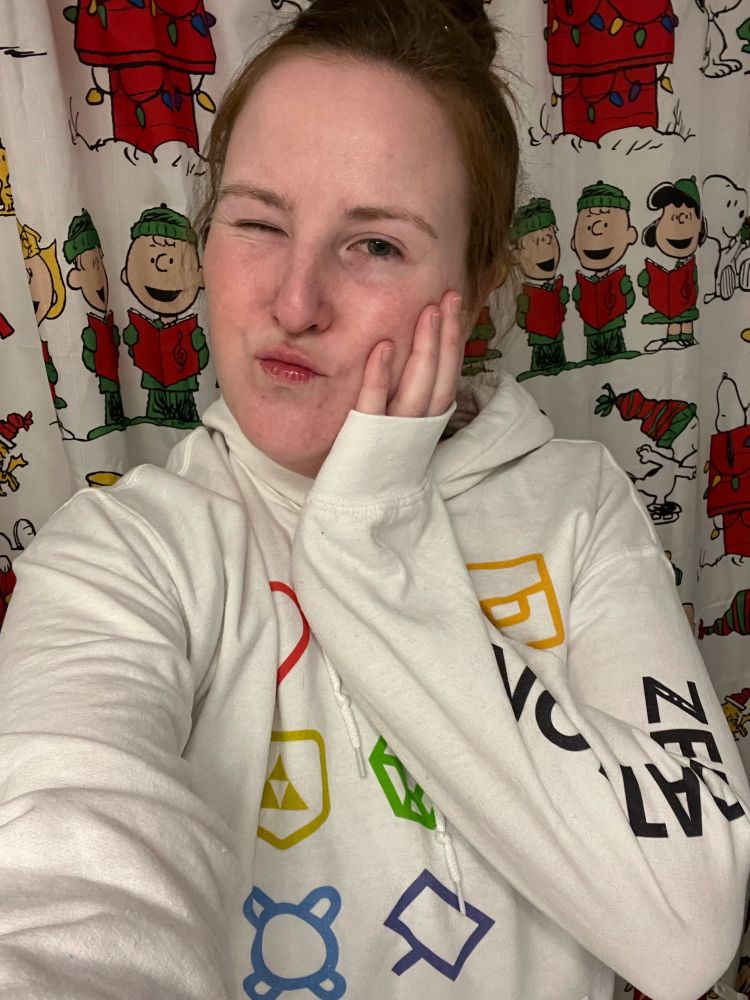 Selfie of person in white zeldathon hoodie