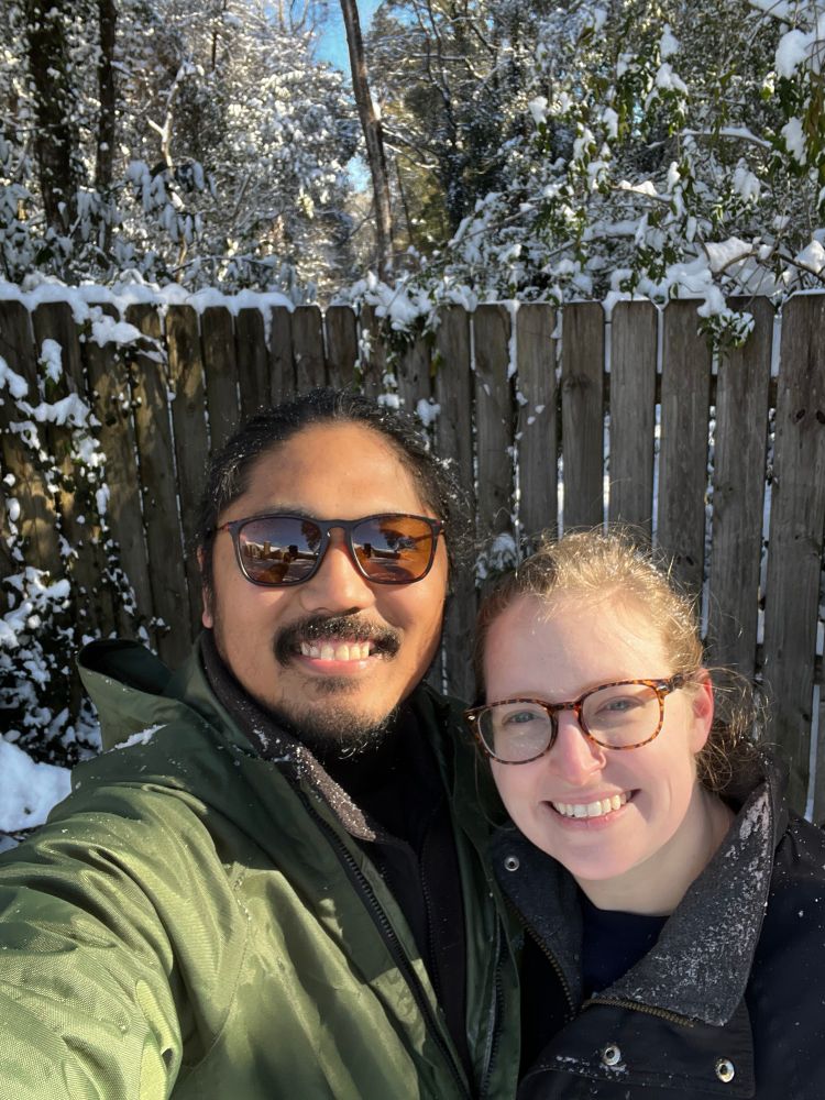 My wife and I posing for a once in a lifetime view of this wintry weather in our backyard.