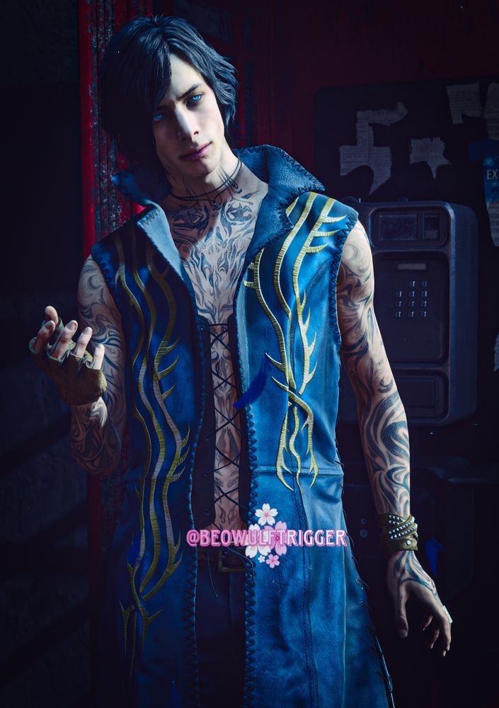 Screenshot taken of V from Devil May Cry 5 but his clothes have Vergil's azure and gold color palette. 