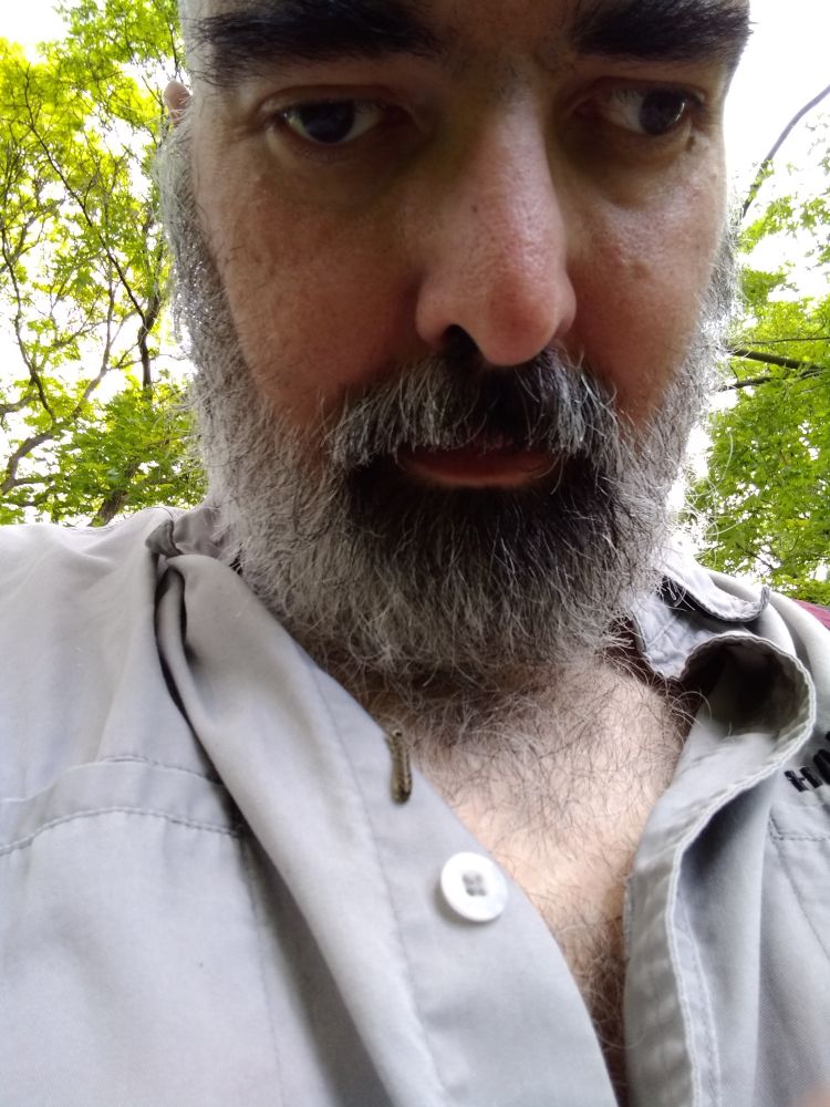 Me looking down to see a caterpillar about to enter my shirt.