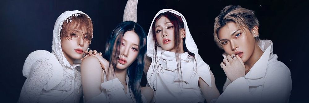 The four members of XLOV in white. Haru, Rui, Wumuti, and Hyun.