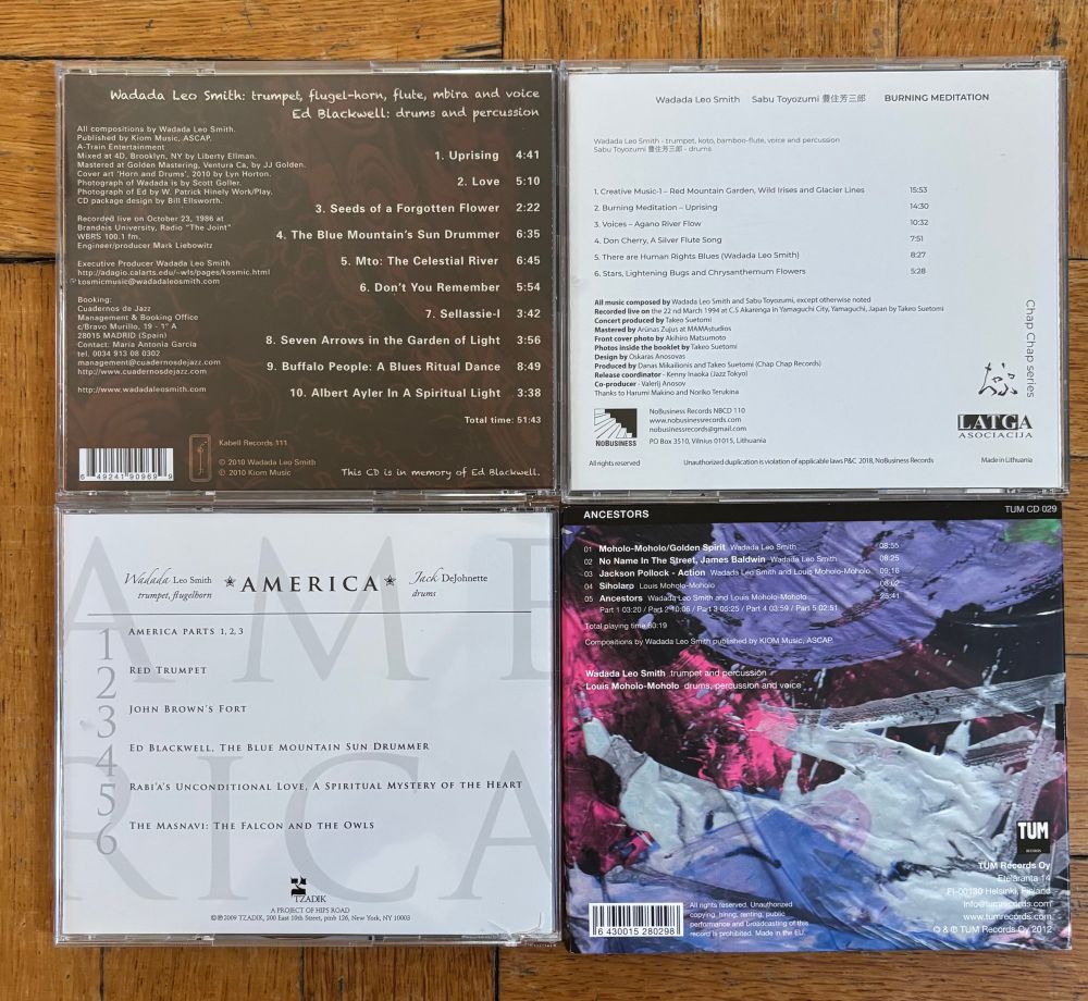 back covers of 4 Wadada Leo Smith CDs
1. Blue Mountain’s Sun Drummer w/ Ed Blackwell
2. Burning Meditation w/ Sabu Toyozumi
3. America w/ Jack Dejohnette
4. Ancestors w/ Louis Moholo-Moholo