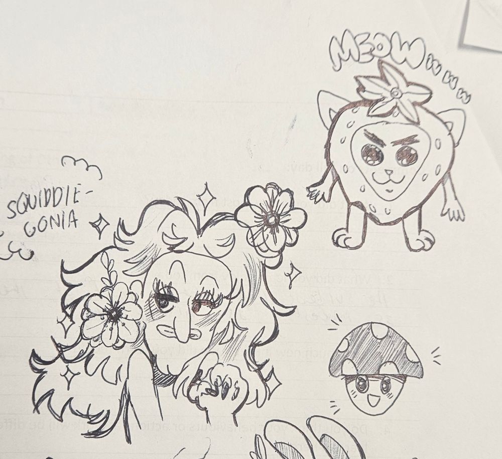 image of doodles in black pen, left to right: squiddie-gonia with flowers in her hair, strawberry kitty going MEOWWW, little mushroom going :D 